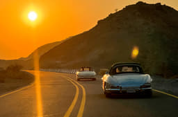Sandra Button in her 300SL following another 300SL.